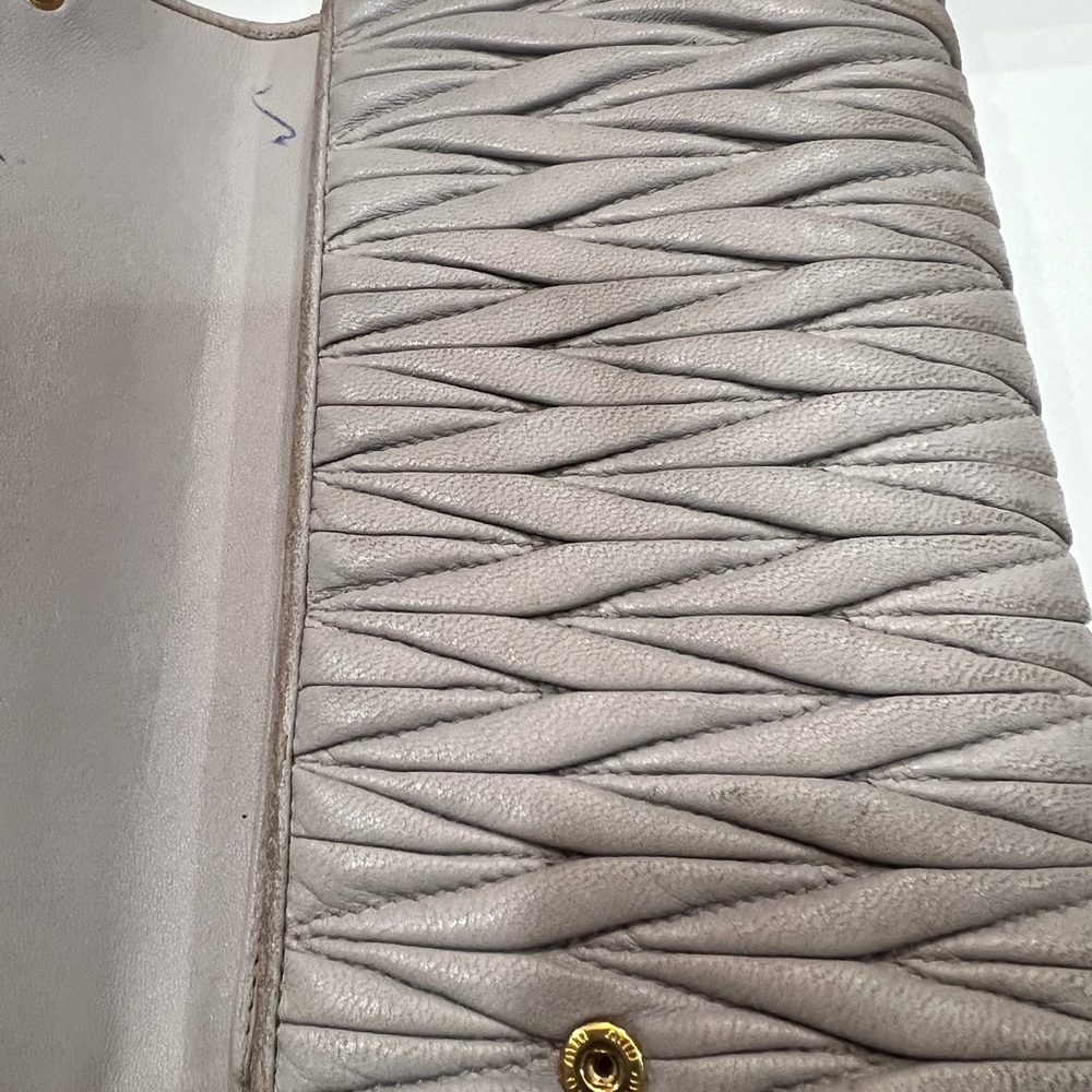 Miu Miu gray wallet.